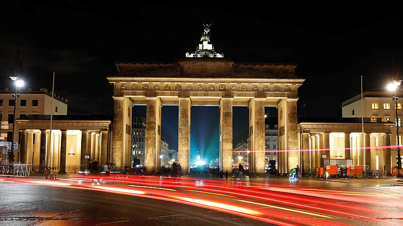 A long time exposure picture shows the Brandenburg Gate in Berlin